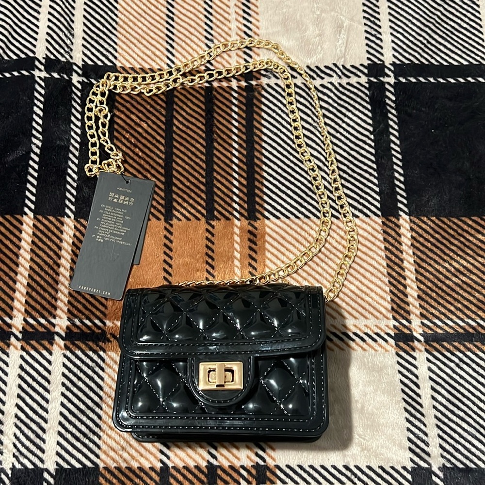 Mini black quilted gold chain purse!